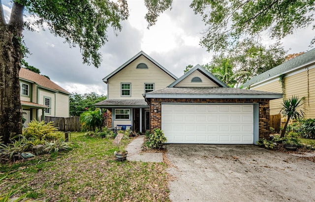 678 Greenglen Ln, Palm Harbor, FL 34684 - view of front of property featuring driveway, brick siding, and an attached garage