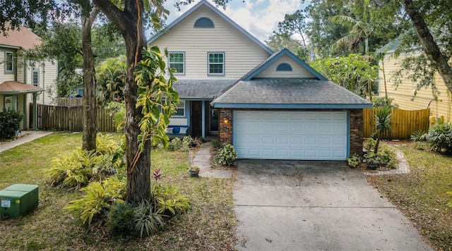 678 Greenglen Ln, Palm Harbor, FL 34684 - traditional home featuring driveway, an attached garage, a shingled roof, and brick siding