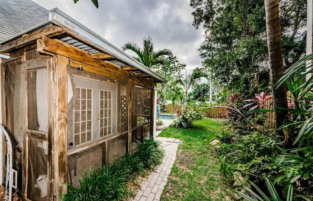678 Greenglen Ln, Palm Harbor, FL 34684 - view of yard with a sunroom