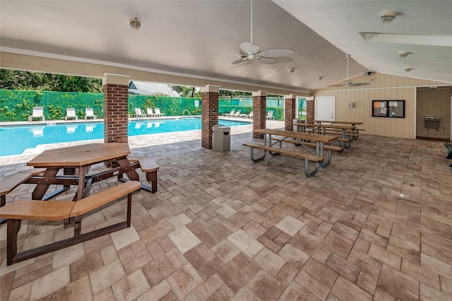 678 Greenglen Ln, Palm Harbor, FL 34684 - community pool featuring ceiling fan, a fenced backyard, and a patio