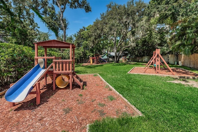 678 Greenglen Ln, Palm Harbor, FL 34684 - view of playground with view of wooded area