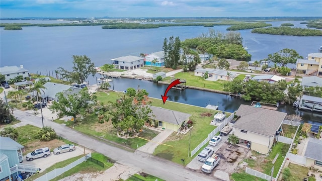 814 Seabreeze Dr, Ruskin, FL 33570 - aerial view of property and surrounding area with a large body of water and nearby suburban area