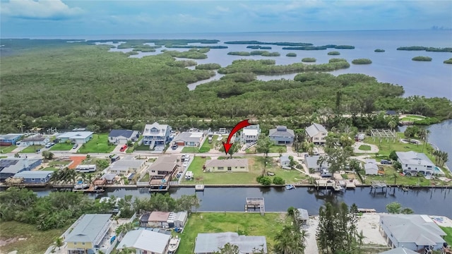 814 Seabreeze Dr, Ruskin, FL 33570 - aerial view of property and surrounding area featuring a nearby body of water and nearby suburban area