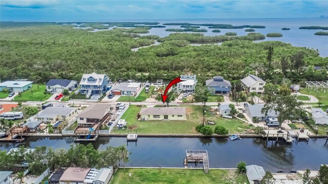 814 Seabreeze Dr, Ruskin, FL 33570 - aerial overview of property's location featuring a nearby body of water and nearby suburban area