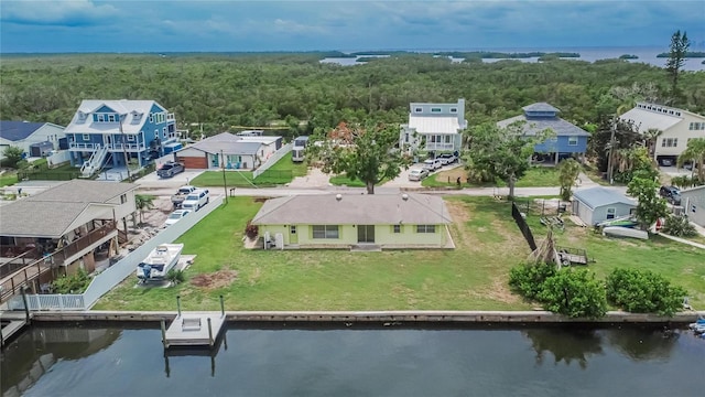 814 Seabreeze Dr, Ruskin, FL 33570 - aerial perspective of suburban area featuring a nearby body of water and a forest