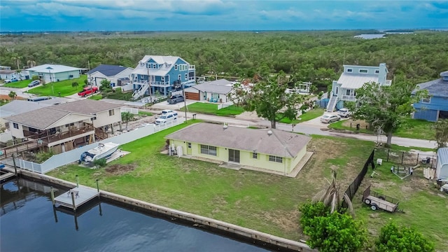 814 Seabreeze Dr, Ruskin, FL 33570 - aerial perspective of suburban area featuring a heavily wooded area and a large body of water