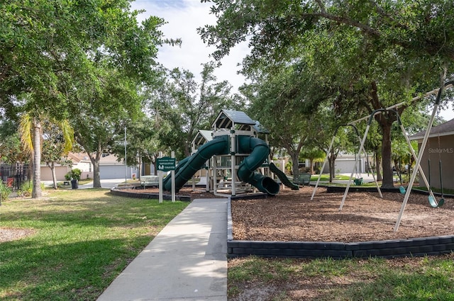 community jungle gym with a lawn
