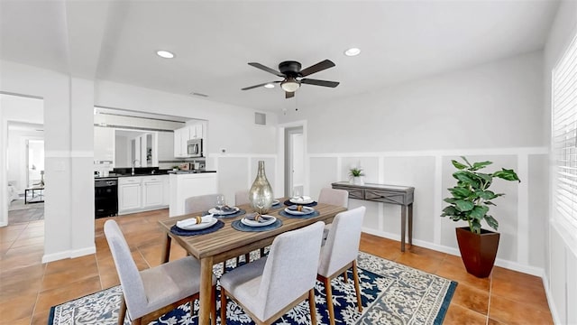 1402 Freemont St S, Gulfport, FL 33707 - dining area with ceiling fan, light tile patterned floors, recessed lighting, and a decorative wall