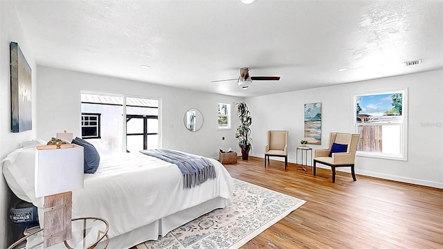 1402 Freemont St S, Gulfport, FL 33707 - bedroom featuring wood finished floors, baseboards, ceiling fan, and recessed lighting