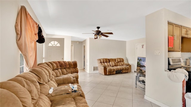 995 Merrimac St, Deltona, FL 32725 - living area with baseboards, ceiling fan, visible vents, and light tile patterned floors