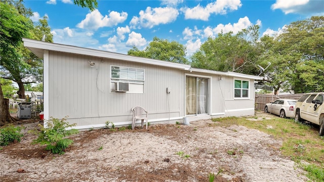 995 Merrimac St, Deltona, FL 32725 - rear view of house with fence