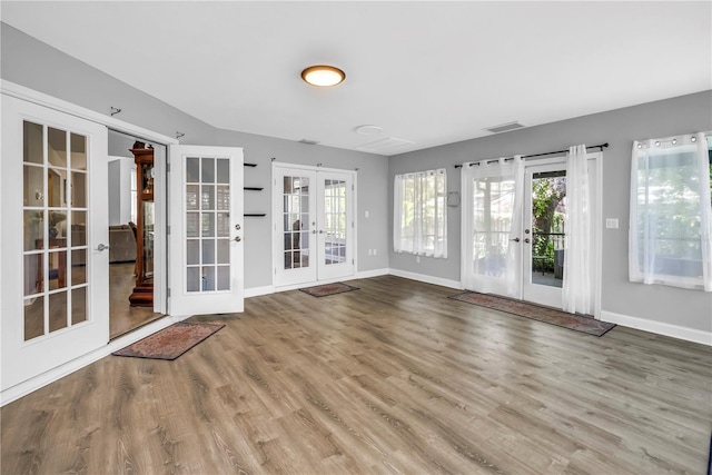 13785 Oak Forest Blvd S, Seminole, FL 33776 - unfurnished sunroom with french doors and visible vents