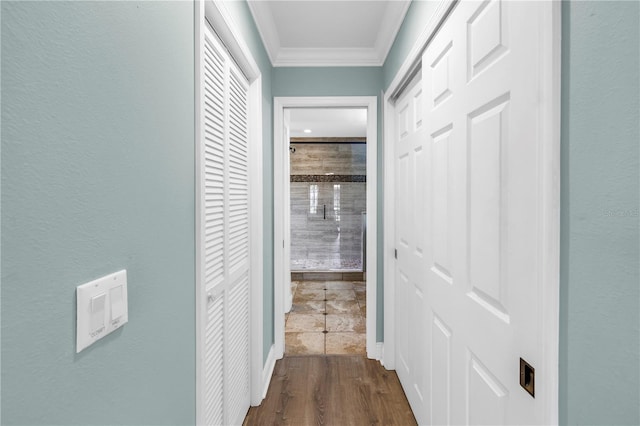 13785 Oak Forest Blvd S, Seminole, FL 33776 - hall featuring crown molding and dark wood-style floors