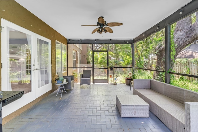 13785 Oak Forest Blvd S, Seminole, FL 33776 - sunroom / solarium featuring french doors, a ceiling fan, and a wealth of natural light