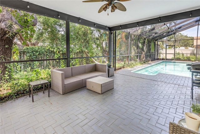 13785 Oak Forest Blvd S, Seminole, FL 33776 - view of swimming pool with a fenced in pool, a ceiling fan, a patio area, and an outdoor hangout area