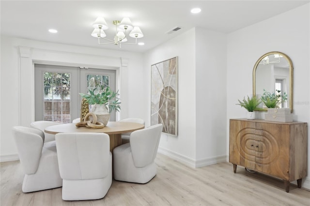 dining area with visible vents, a chandelier, baseboards, recessed lighting, and wood finished floors