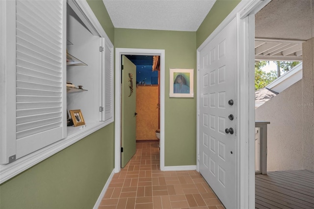 5115 S Jules Verne Ct, Tampa, FL 33611 - foyer entrance with brick patterned floor and baseboards