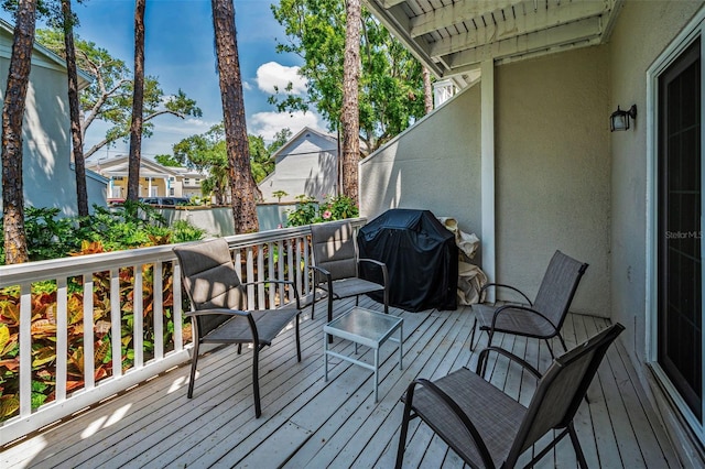 5115 S Jules Verne Ct, Tampa, FL 33611 - wooden deck with a residential view and a grill