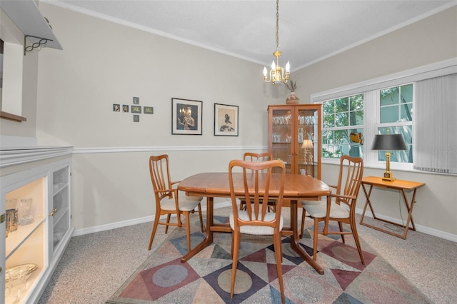 5115 S Jules Verne Ct, Tampa, FL 33611 - carpeted dining space featuring baseboards, ornamental molding, and a notable chandelier