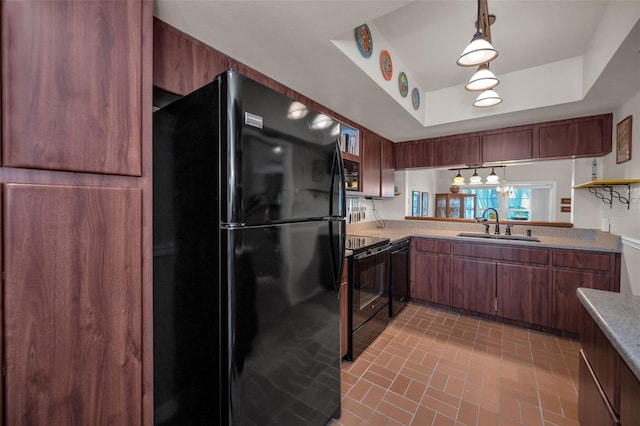 5115 S Jules Verne Ct, Tampa, FL 33611 - kitchen featuring a sink, brick patterned floor, a tray ceiling, black appliances, and light countertops