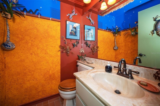 5115 S Jules Verne Ct, Tampa, FL 33611 - half bath with tile patterned floors, vanity, and toilet