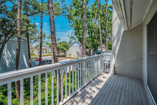 5115 S Jules Verne Ct, Tampa, FL 33611 - wooden deck featuring a residential view
