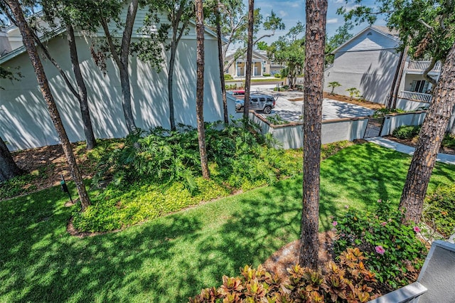 5115 S Jules Verne Ct, Tampa, FL 33611 - view of yard with fence and a residential view