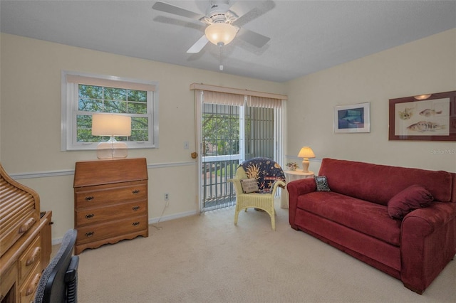 5115 S Jules Verne Ct, Tampa, FL 33611 - living area featuring ceiling fan, baseboards, and carpet floors