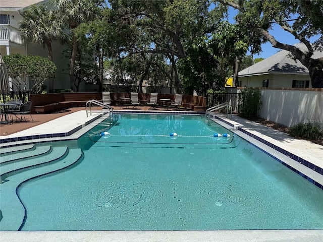 5115 S Jules Verne Ct, Tampa, FL 33611 - pool with a patio area and fence