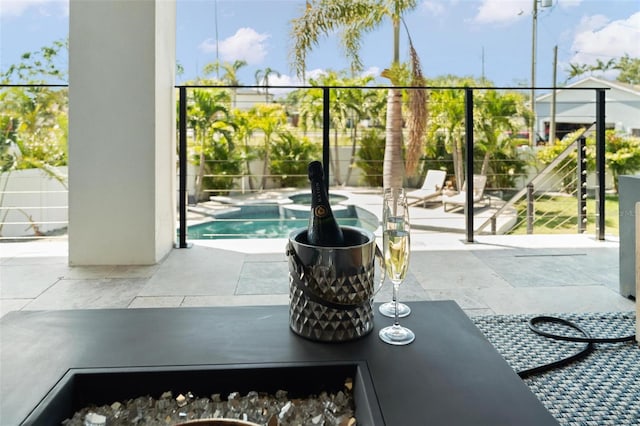 exterior space with a pool and a patio
