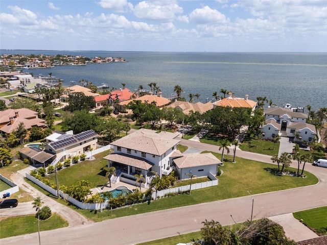 bird's eye view featuring a residential view and a water view