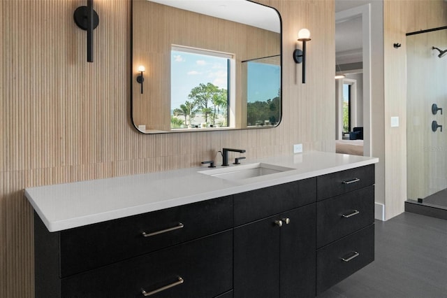 full bathroom with vanity and a stall shower