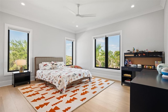 bedroom featuring recessed lighting and multiple windows