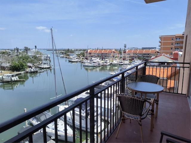 balcony featuring a water view