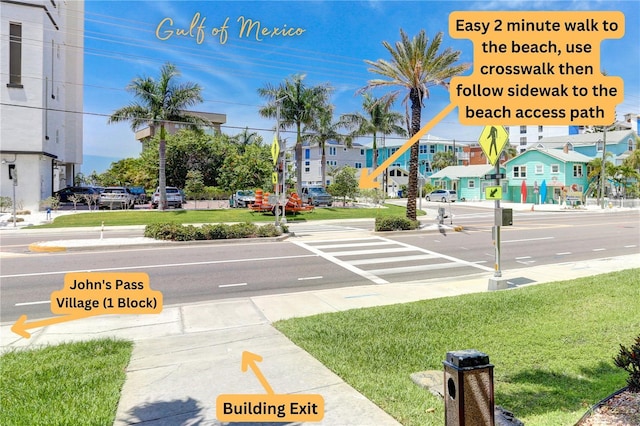 view of road with sidewalks and curbs