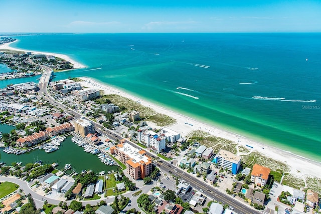 aerial view featuring a water view and a view of the beach
