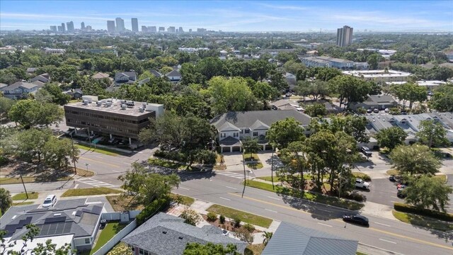 birds eye view of property with a view of city