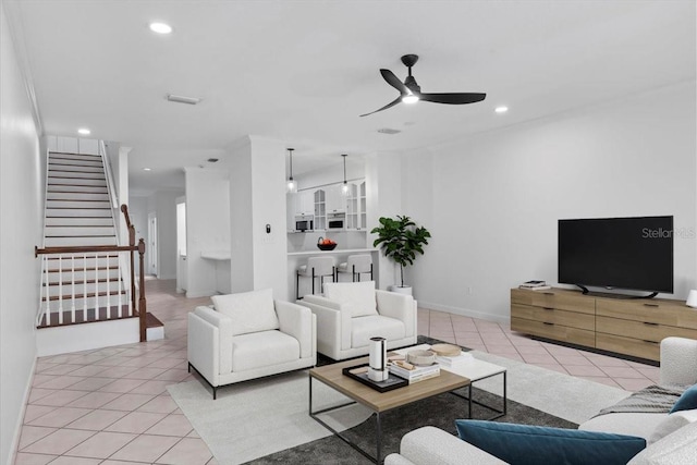 202 S Lincoln Ave, Tampa, FL 33609 - living area featuring light tile patterned floors, a ceiling fan, stairs, and recessed lighting