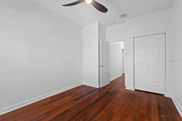 202 S Lincoln Ave, Tampa, FL 33609 - unfurnished bedroom with wood finished floors, a closet, and a ceiling fan