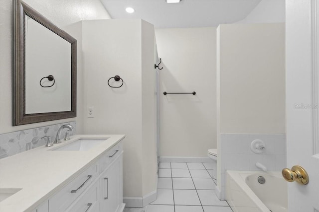 202 S Lincoln Ave, Tampa, FL 33609 - bathroom with double vanity, tile patterned floors, and a garden tub