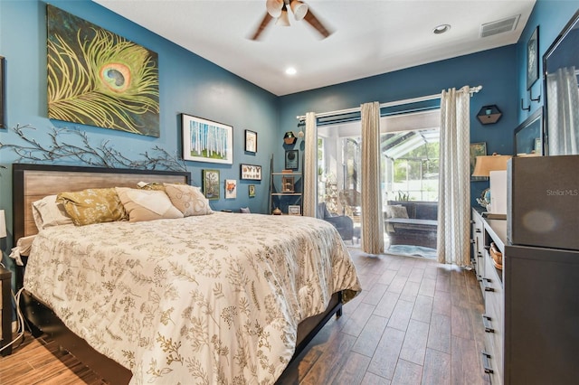 1939 Heartland Cir, Valrico, FL 33594 - bedroom featuring visible vents, dark wood-style flooring, access to outside, recessed lighting, and a ceiling fan