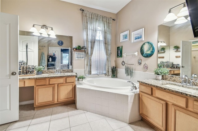 1939 Heartland Cir, Valrico, FL 33594 - bathroom featuring a sink, tile patterned flooring, a bath, and two vanities