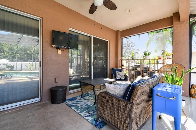1939 Heartland Cir, Valrico, FL 33594 - sunroom / solarium featuring ceiling fan and plenty of natural light