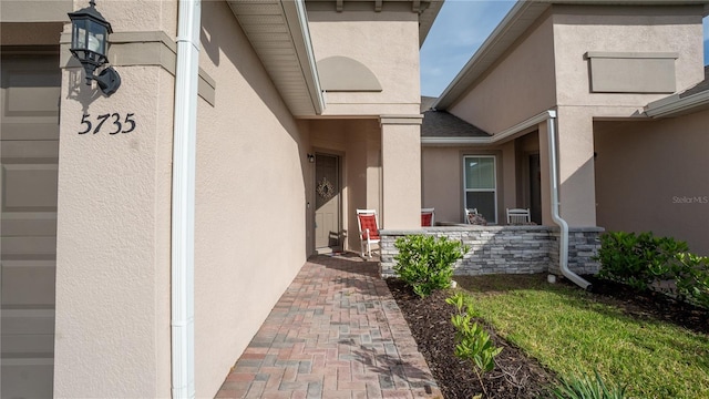 5735 Mezzana Run, Palmetto, FL 34221 - property entrance with stucco siding