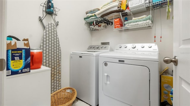 5735 Mezzana Run, Palmetto, FL 34221 - washroom with washer and dryer and laundry area