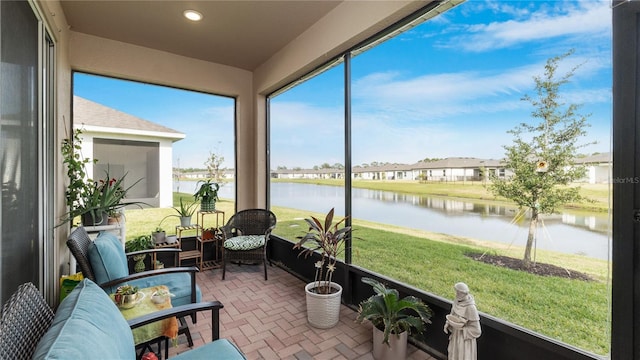 5735 Mezzana Run, Palmetto, FL 34221 - sunroom featuring a water view