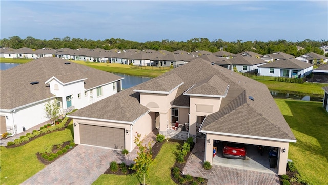 5735 Mezzana Run, Palmetto, FL 34221 - birds eye view of property with a residential view and a water view