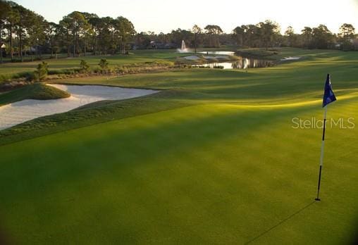view of home's community with golf course view