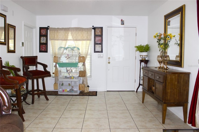 foyer featuring light tile patterned floors