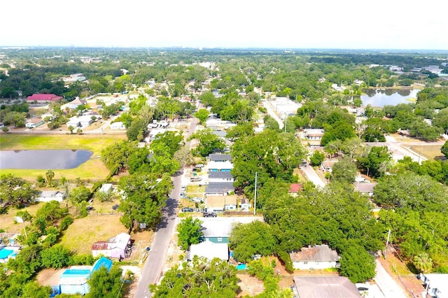 bird's eye view featuring a residential view and a water view